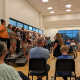 choir singers on risers with conductor